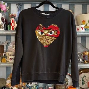 Comme Des Garçons Play black crew neck sweatshirt w/ reversible red gold sequins